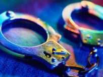 Two Cops Arrested for Breaking Into Cars