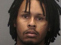 Man Punches Wife, Infant in the Head