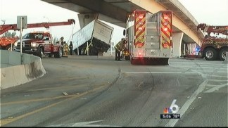 Dangling Box Truck Pulled Onto South Florida Highway Overpass