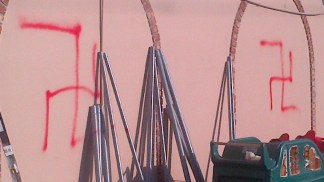 Day Care Marred By Fire, Swastikas; Owners Call it Hate Crime