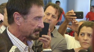 John McAfee Speaks With Reporters Outside Beacon Hotel in Miami Beach