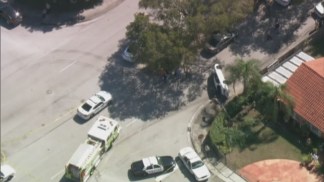 RAW VIDEO: Ford Taurus Ends Up on Side After Chase with Miami-Dade Police