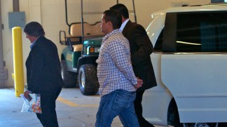 Zimmerman Surrenders