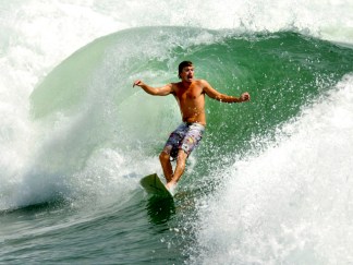 Hurricane Bill Brings Swells and Surfers