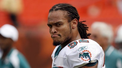 MIAMI - OCTOBER 19: Linebacker Channing Crowder #52 of the Miami Dolphins during a break in the action against the Baltimore Ravens in the first quarter at Dolphin Stadium on October 19, 2008 in Miam MIAMI - OCTOBER 19: Linebacker Channing Crowder #52 of the Miami Dolphins during a break in the action against the Baltimore Ravens in the first quarter at Dolphin Stadium on October 19, 2008 in Miam