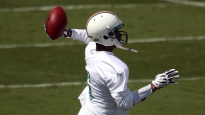 DAVIE, FL - MAY 02: Rookie quarterback Pat White #6 of the Miami Dolphins drops back to pass during mini camp on May 2, 2009 at the Miami Dolphins Training facility in Davie, Florida. (Photo by Mar DAVIE, FL - MAY 02: Rookie quarterback Pat White #6 of the Miami Dolphins drops back to pass during mini camp on May 2, 2009 at the Miami Dolphins Training facility in Davie, Florida. (Photo by Mar