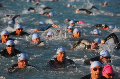 A human herd with the hit the waters off Miami next year for the Ironman competition.