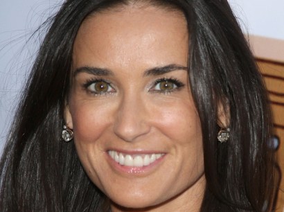 "Man vs. Wild" star Bear Grylls wants to go on a survival adventure with Demi Moore.