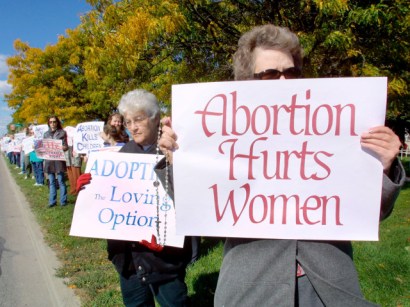 A Michigan pro-life activist was gunned down in front of a high school Friday.
