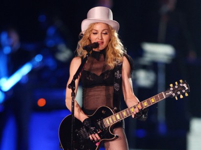 Madonna donated a pair of her shoes to help raise money for Gypsy child education.