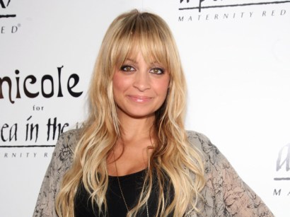 A judge has granted Nicole Richie's request for a restraining order barring two celebrity photographers from coming close to her or her children.