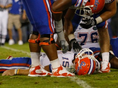 University of Florida star quarterback Tim Tebow was taken to the hospital by ambulance after sustaining a hard hit to the head in a game against rival the University of Kentucky Saturday night. 