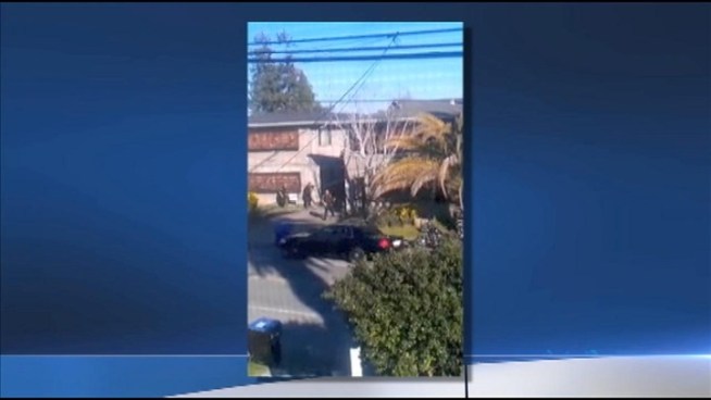 A witness recorded this footage of a firefight between police officers and a gunman on Feb. 26, 2013, in the 800 block of North Branciforte Avenue in Santa Cruz, Calif. Dozens of gunshots can be heard echoing in the residential neighborhood where the shooting happened, killing two police officers and the gunman. <a href=