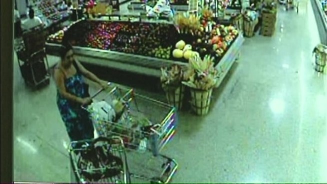 Sunny Isles Beach Police are looking for a female purse snatcher who was caught on tape stealing an elderly woman's bag at a Publix supermarket.