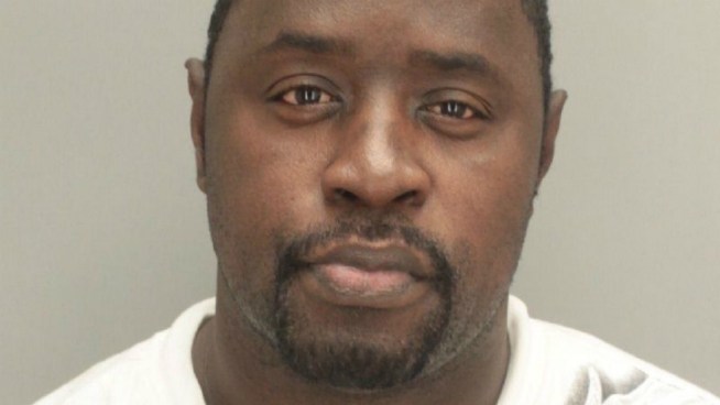 Police said they arrested a teacher s assistant at South Miami Heights Elementary School for peeping on female staffers as they used the ladies  bathroom. NBC 6 reporter Steve Litz has the story.