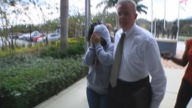 Jennifer Moreno turned herself in Tuesday to face a grand theft charge after she was spotted on surveillance video stealing expensive eyeglasses, police said. Coral Springs Police Lt. Joe McHugh and Michael Silverman, the owner of Eagle Eyecare, spoke about the case.