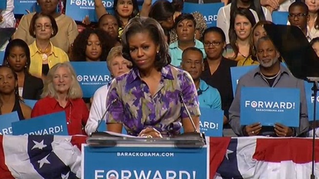 Stars Marc Anthony and Gabrielle Union attend a rally with Michelle Obama in Miami.