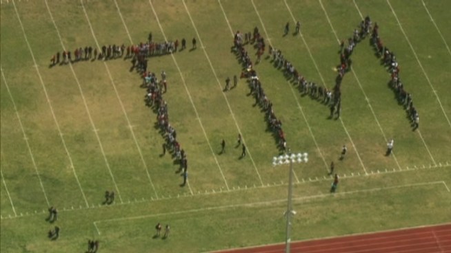 Aerial footage of students in Cutler Bay in south Miami-Dade County formed a TM in support of Trayvon Martin, the 17-year-old who was fatally shot by a neighborhood watch volunteer in Sanford. Martin, from Miami Gardens, was visiting the central Florida city with his father. Students from all over South Florida staged walkouts on Friday.