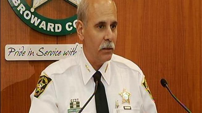 Suspect is father of unharmed 11-month-old who was at the scene.