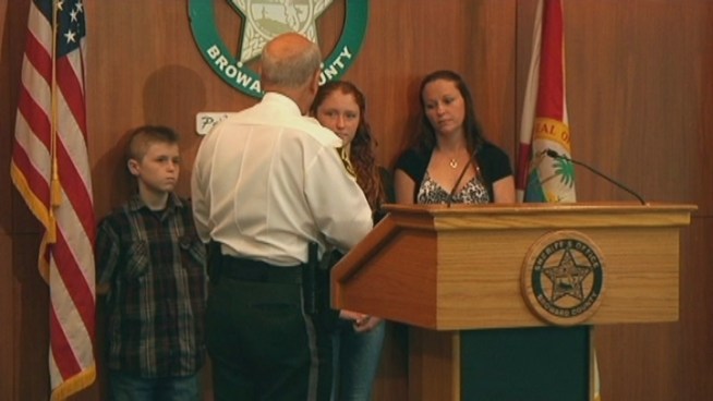 Alexis Stannis, 13, explained how she and her little brother Darren hid as three robbers tried to break in to their Pompano Beach home last week. BSO Sheriff Al Lamberti honored the two siblings on Monday. Darren, 10, shared some of his tips for warding off intruders.