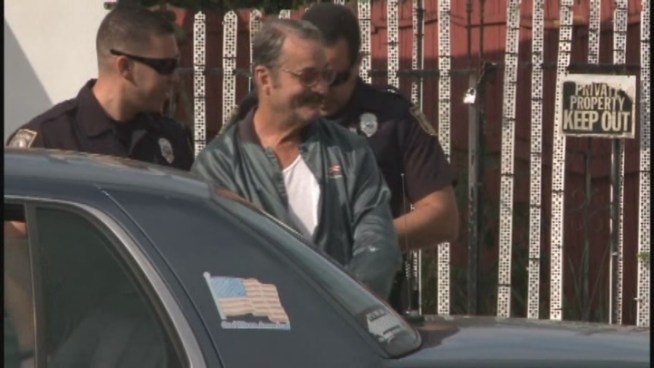 Hialeah Police said they arrested Salvador Espinosa after he posed as one of their own. No one answered the door at Espinosa's Hialeah home Sunday afternoon. Shopper Juan Sanchez gave his theory for Espinosa's motive.