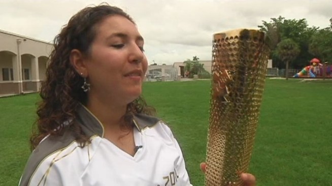 Jillian Roberts had the opportunity to be an Olympic torchbearer at the 2012 London Olympic Games. On Monday, she returned to the Mary and Dave Alper JCC Summer Camp in Kendall on Monday to share her experience with campers. Art teacher Robin Clavan and camp counselor Josh Clarin talked about what it was like to have the torchbearer return.