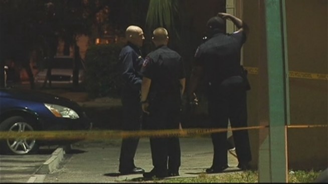 Xavier Melton was shot just before midnight at the Royal Palm Apartments. His wife, Janicia Melton, said he was shot once in the chest.