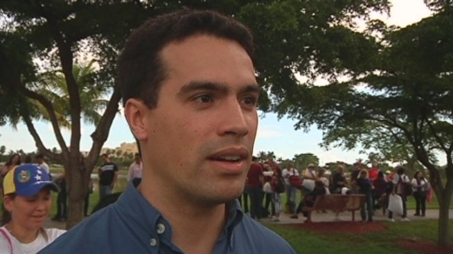 Thousands of South Florida's Venezuelans waited in long lines at J.C. Bermudez Park Saturday just for a spot on one of a dozen buses headed to New Orleans. Voters Andrea Bauza and Marco Sanjoa and organizer Vanessa Duran talked about why they were making the journey.