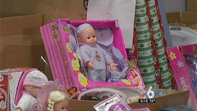 At the Children's Diagnostic and Treatment Center, a meeting room serves as one of Santa's South Florida toy shops. NBC 6 reporter Diana Gonzalez interviews Ana Calderon, with the Children's Diagnostic and Treatment Center.