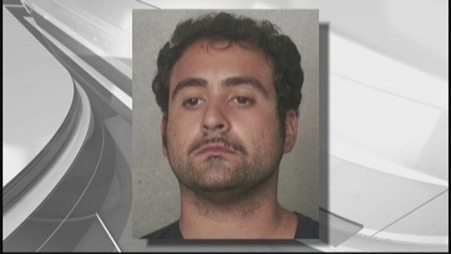 Authorities say the suspect charged with killing a homeless man in a Deerfield Beach alley confessed to the crime in a 911 call released Tuesday. John Stabile, 23, has been charged with first-degree murder in the death of Bradley Suessine, 42. Richard Stabile said earlier this week that his son suffers from paranoid schizophrenia and bipolar disorder.