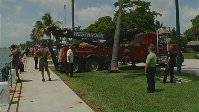 Authorities were investigating after a UPS truck took a detour into Biscayne Bay Wednesday morning. The truck went into the water at Northeast 95th Street and N. Bayshore Drive. Aerial footage showed the badly damaged truck standing in water several feet from shore. Chief Kevin Lystad said the driver told him he had an equipment failure.