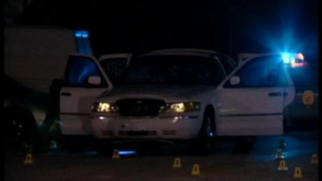 Police are investigating after two people were shot to death inside a car in Northwest Miami-Dade Monday night.