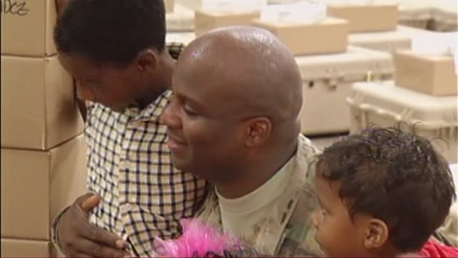 Soldiers with the 841st Engineer Battalion arrived for a tearful reunion with family Monday morning at the U.S. Army Reserve base in northwest Miami-Dade. Medical Officer Ray Rakhar talked about coming home as he held his 3-year-old son. Meantime, Madison and Matthew Touissant welcomed their dad home.