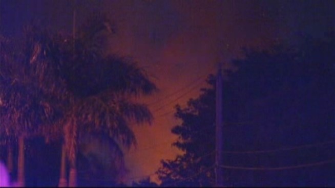 The only person believed to have survived a raging inferno and shootout with police walked out of the Miami-Dade County Jail Friday night with scrapes and scratches on his head. NBC 6 reporter Steve Litz spoke to Brian Howell.