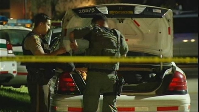Miami-Dade Police and SWAT officials were at the scene of a barricaded subject on Sunset and 109th Avenue Friday. A neighbor tells NBC 6 what he saw unfold.