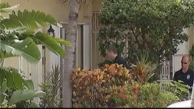The reward in the killings of David Pichosky and Rochelle Wise has been increased, while Hallandale Beach Police Chief Dwayne Flournoy said investigators believe the couple was asphyxiated. Wise's son, Jamie Wise, asked for the public's help.