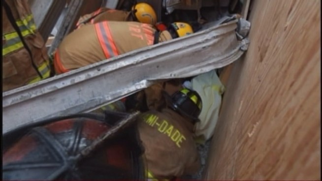 Miami-Dade's rescue experts went into action and searched the collapsed parking garage site for trapped workers. They were able to free one man and move him out for a trip to the hospital. Miami-Dade Fire Rescue Capt. Louie Fernandez and Miami Dade College spokesman Juan Mendieta provides updates from the scene.