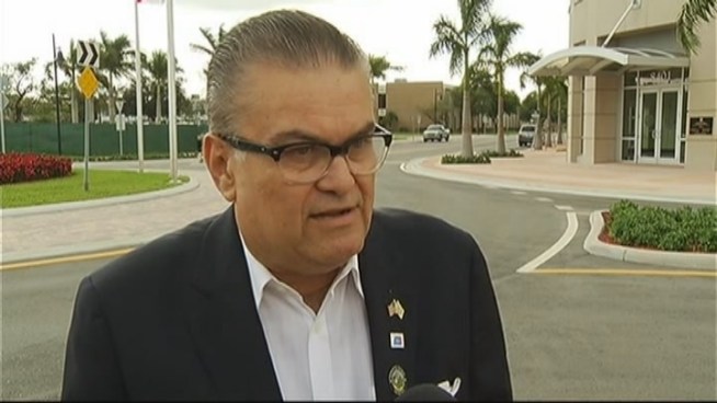 With 80 percent of residents speaking Spanish, Doral Mayor Luigi Boria wants to make Spanish the city's second official language. Community activist Felipe Madrigal disagrees. Doral resident Norberto Spangaro is also against the move.