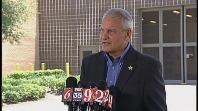 Seminole County Sheriff Donald Eslinger and attorney Mark O'Mara talk to reporters after George Zimmerman turned himself into authorities. Zimmerman was booked at the John E. Polk Correctional Facility with no bond status.