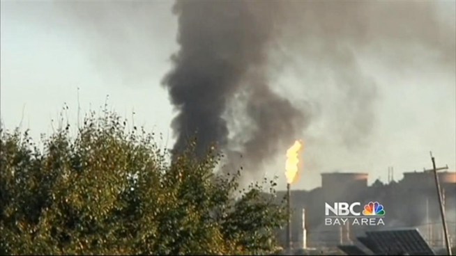 A controlled burn at the Chevron refinery in Richmond continued Tuesday morning, though the main blaze that ripped through the plant - and could be seen for miles - was put out late Monday night