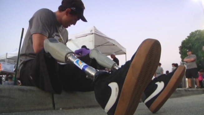 Rudy Garcia-Tolson assembled his prosthetic limbs for a 5K run through Dolphin Mall on Sunday. The Paralympic gold medalist told NBC 6 South Florida that 
