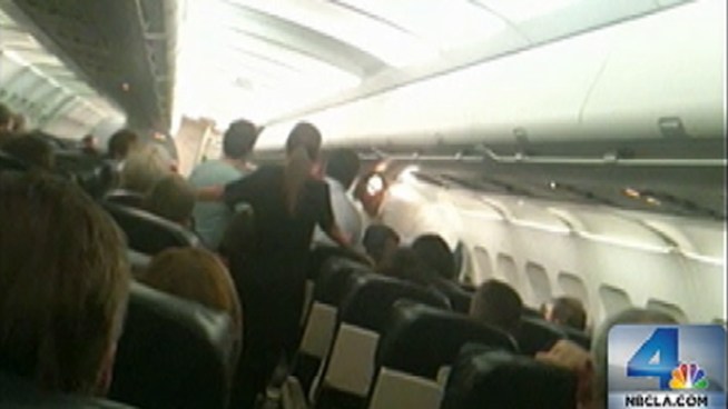 Passengers wrestled an unruly man to the ground during flight to John Wayne Airport this week. Actor Arash Durrani allegedly refused to stay in his seat, and now faces felony charges for interfering with flight crew. Vikki Vargas reports from John Wayne Airport for the NBC4 News at 5 p.m. on Sept. 27, 2012.