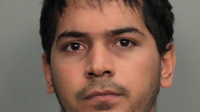 Christopher Michael Mora, 27, faces two counts of lewd and lascivious molestation on a child, authorities said. Neighbor Jorge Vanges and Miami-Dade Police spokeswoman Aida Fina-Milian discussed the case.