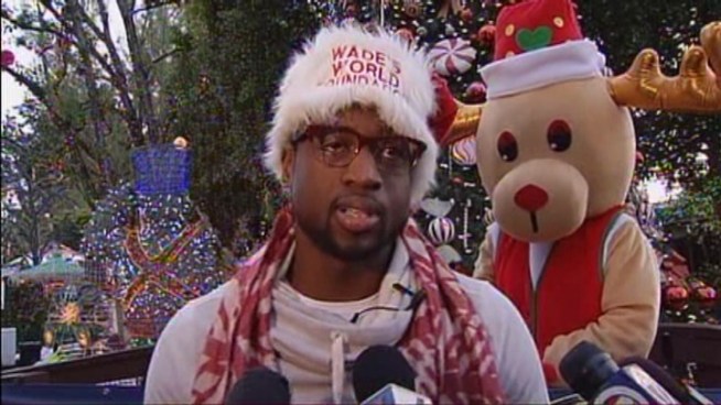 Donning a red and white Santa hat, Miami Heat guard and NBA All-Star Dwyane Wade spent time with other fathers and their children at Santa s Enchanted Forest. NBC 6 South Florida spoke with the star about the importance of a father-child relationship.