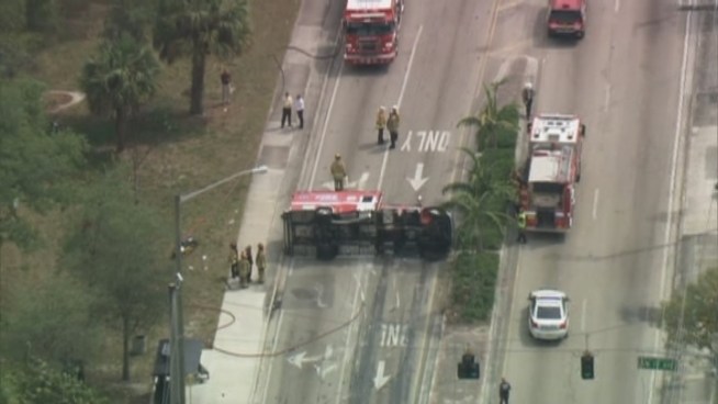 A Fort Lauderdale Fire Rescue unit that was transporting a patient to the hospital ended up overturned following a crash Wednesday morning, officials said.