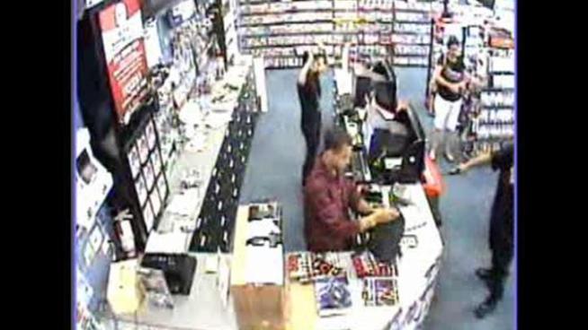 Authorities are trying to find a serial video game store robber who has hit three different stores in three days.