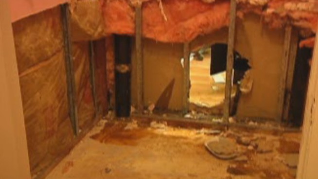 A Coral Springs cell phone store was forced to shut its doors Monday after burglars broke in through holes they made in a wall from the place next door, police said. Store owner Sammy Balkis talked about how the criminals robbed the store.