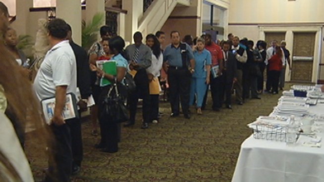 Crowds of job seekers were expected to converge on the Signature Grand in Davie Wednesday morning where some 400 openings were up for grabs from Miami-Dade to Palm Beach County. Companies from Aflac to Domino's Pizza, the Miami Herald, and Home Depot were looking to fill 140 different kinds of jobs.