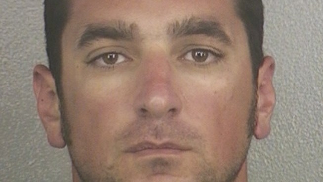 A Fort Lauderdale firefighter was arrested after police said he threatened another member of the fire department to disclose information about a criminal case.