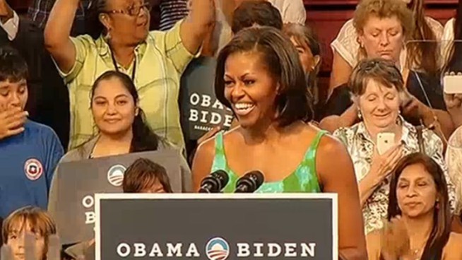 Thousands of people waited in the summer heat for a chance to hear first lady Michelle Obama speak at a Miami Lakes school on Tuesday afternoon. While Obama supporter Morgan Owens said she enjoyed to hear the first lady speak, school board member Renier Diaz de la Portilla said public schools are 